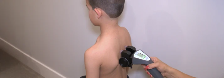 A pediatric patient being scanned with the CLA Scanner