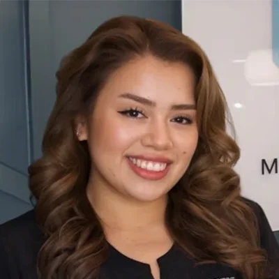 A headshot photo of Stephany, the office manager of Thrive Integrative Health