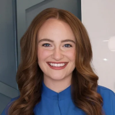 A headshot photo of Kate Reiter, a chiropractor at Thrive Integrative Health